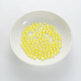 BD00063-01-white-letter-bright-yellow-transparent-coin-alphabet-beads-mix-4×7mm